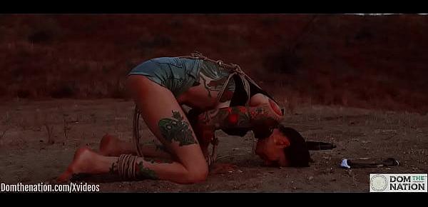  Ass eating bondage slave cries while her feet get caned outdoors in the dirt - Rocky Emerson